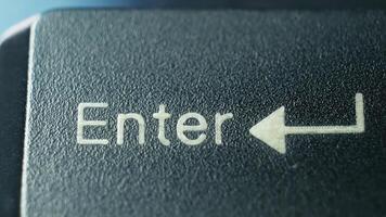 Close-Up View of Enter Key on Computer Keyboard With Clear Directional Arrow photo