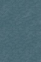Dark blue fabric background made of textile material with a woven pattern. Texture of knitted fabric made from blue yarn. photo