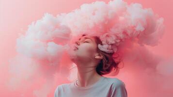 Young Woman Immersed in Pink Clouds Expressing Serenity and Imagination photo