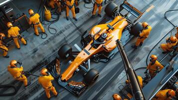 High-Angle View of Formula One Pit Stop Crew Working on Race Car photo