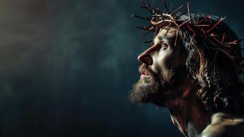 Dramatic Portrait of Jesus Christ with Crown of Thorns in Contemplative Pose photo