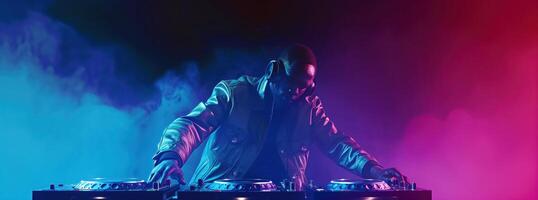 DJ Performing at Nightclub with Colorful Lights and Smoke Effects photo