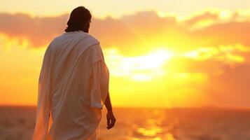 Jesus Christ Standing by the Sea at Sunset Embracing Redemption photo