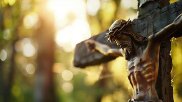 Serene Image of Jesus Christ on the Cross Surrounded by Soft Sunlight and Nature photo