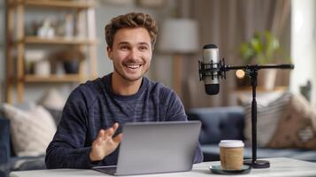 Smiling YouTuber Recording a Podcast at Home with Microphone and Laptop photo