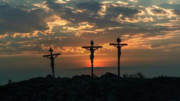 Silhouette of Three Crucifixions of Jesus Christ at Sunset with Dramatic Sky photo