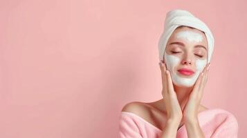 Relaxed Woman Enjoying Skincare Routine with Facial Mask on Soft Pink Background photo