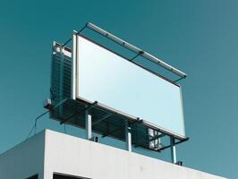 Low Angle View of a Blank Billboard Against a Clear Blue Sky for Advertising Inspiration photo