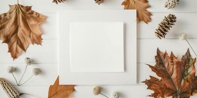 Autumn Mockup With Blank Postcard Surrounded by Fall Leaves and Pinecones on White Background photo