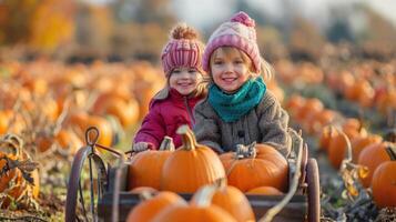 Two Kids Riding in a Wagon Through a Pumpkin Patch on a Sunny Autumn Day photo