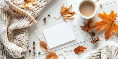 Autumn-Themed Postcard Mockup with Fall Leaves, Sweater, and Coffee photo