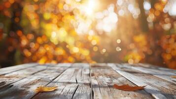 White Wooden Table With Blurred Autumn Leaves Background in Warm Sunlight photo