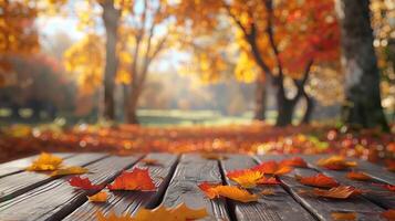 Autumn Leaves on Wooden Table with Tranquil Blurred Forest Background photo