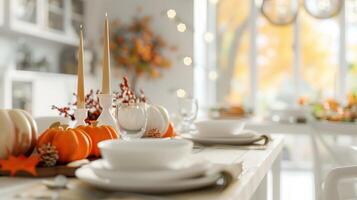 Elegant Autumn Table Setting with Pumpkins and Candles for a Festive Gathering photo