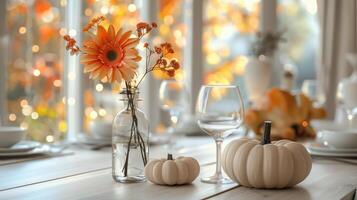 Elegant Autumn Table Setting with Flower Bouquet and Mini Pumpkins photo