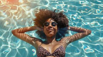 Sun-Kissed Woman Relaxing in Pool with Radiant Joy and Sunglasses photo