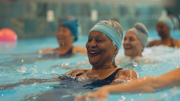 Happy Senior Women Enjoying Aqua Fitness Class with Laughter and Smiles in a Pool photo