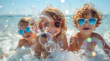 Happy Children Playing with Bubbles at the Beach on a Sunny Day photo