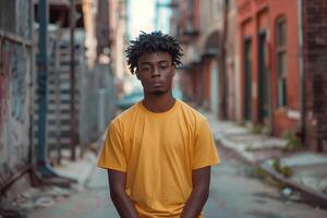 Candid Photo of Young Man in Yellow T-Shirt in Urban Street