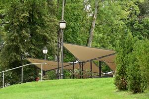 a park with a canopy over it photo
