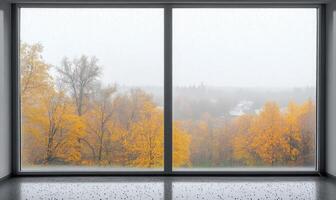 Warm interior, large window, view of misty autumn landscape photo