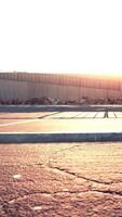 Empty beach car park spaces covered in asphalt. video