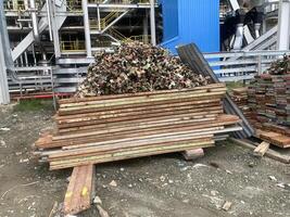 Lot of Asiba scaffolding and double clamp lay on the site power plant area. photo