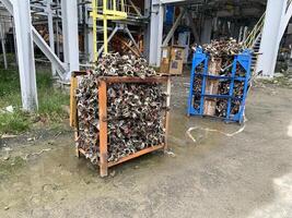 Lot of clamp scaffolding on the rack. photo