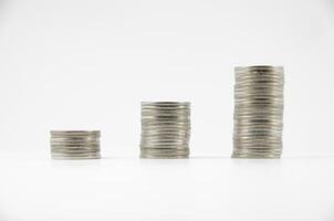 three thai coin stacks on white background photo