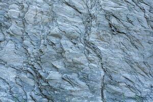 Close-up sharp cliff rock texture background image photo