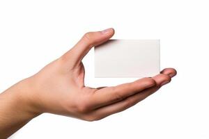 Hand holding a blank card on a white background photo