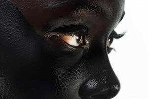 Close-up of the face of a man with dark skin photo