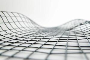 Black mesh surface with curves on white background photo
