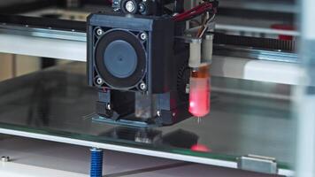 Close-up view of the operation of a modern, automated powder-based CNC 3D printer manufacturing metal parts. Slow motion. video
