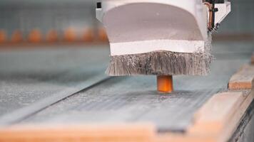 Operation of a timber milling machine in the context of furniture production. Close up. Slow motion video