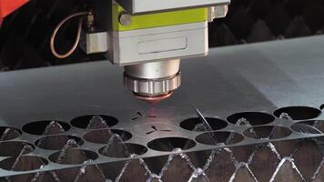 Process of laser cutting metal is a highly precise and automated operation. As the programmed machine operates, sparks are generated, and the sophisticated equipment precisely cuts the desired components. Close up. Slow motion video