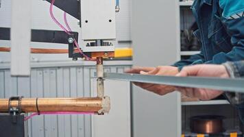 Process of manual welding of a metal angle joint by a skilled worker. Medium shot. Slow motion video