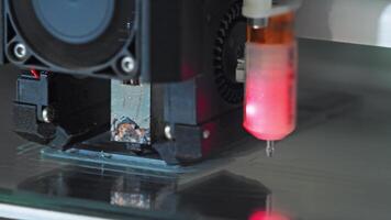 Mobile component of a state-of-the-art industrial 3D printer reproduces the object. Slow motion. Close up. video
