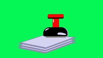 Red handle with green screen, black base stamper on paper stack, useful for office supplies, business documents, stationary, administrative, clerical tasks. video