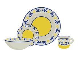 A set of plates and cups with yellow and blue designs vector