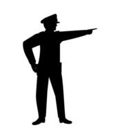 Silhouette of a policeman pointing at something vector