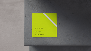mockup of square card on cracked concrete step seen from above with blurred background psd