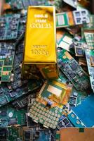 pile of electronic waste on factory floor is circuit board of mobile phone waiting to be processed extract gold to separate precious metal from electronic waste. extracting precious metal from e-waste photo