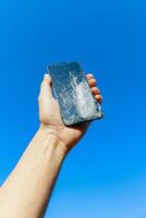 damaged LCD screens of mobile phones are collected as electronic waste waiting for valuable metals inside LCD screens be sorted for reuse reducing e-waste in nature and increasing value of e-waste. photo