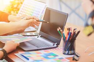 Smooth Focus, group of web designers are working together to develop mobile responsive website with UI UX Front End Designer Previewing. website designers in form of mobile applications with UI UX photo