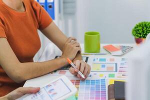 Smooth Focus, group of web designers are working together to develop mobile responsive website with UI UX Front End Designer Previewing. website designers in form of mobile applications with UI UX photo