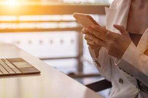A young woman is using an app to discuss and discuss the issues of online learning because it is in school closure after the coronavirus pandemic. Concept of online problem consultation photo