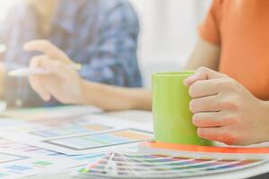 Smooth Focus, group of web designers are working together to develop mobile responsive website with UI UX Front End Designer Previewing. website designers in form of mobile applications with UI UX photo