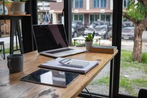 Inside the office there is a desk that is prepared for businessmen to start working every morning. A comfortable and ready-to-work desk idea to start your work every morning with joy. photo