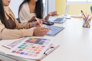 Smooth Focus, group of web designers are working together to develop mobile responsive website with UI UX Front End Designer Previewing. website designers in form of mobile applications with UI UX photo